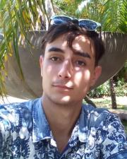 Profile picture of Luis Javier Madrigal Roca outside under palm trees